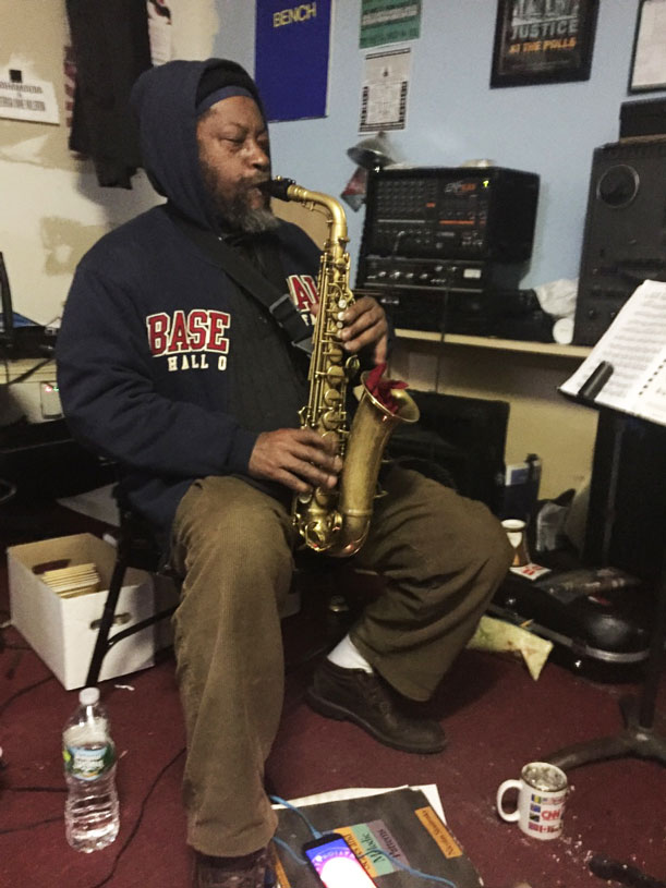 Aaron Martin playing saxophone